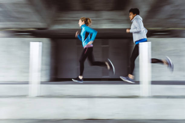 istock Two Female Athlete Running, Blurred Motion 1063897884