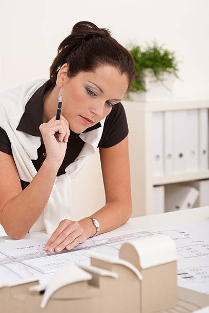 istock Successful architect woman working at the office 106389994