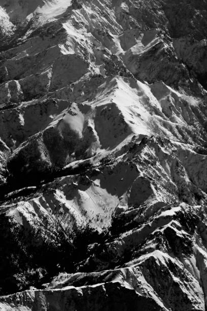 istock snowy mountains seen from a plane 1063905000