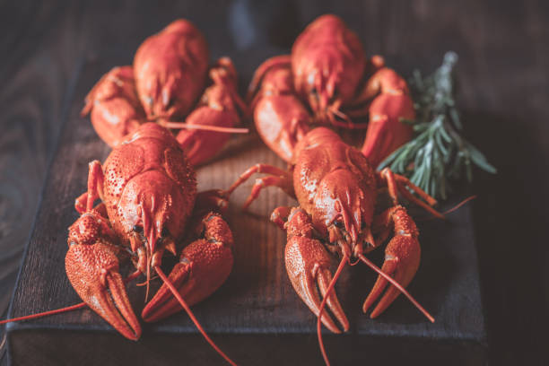 istock Boiled crayfish on the wooden board 1063906912