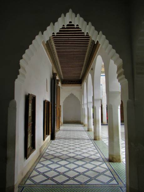 istock Symmetry in a white corridor 1063907266