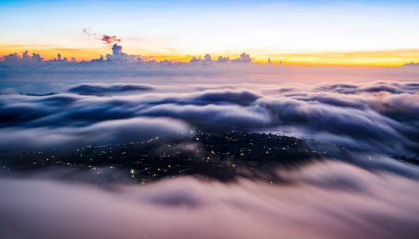 istock over the city through the clouds, landscape long exposure 1063907640
