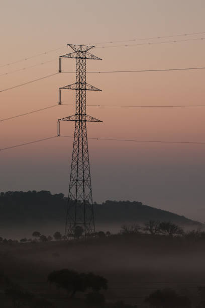 istock Electric towers in the mist 1063907700