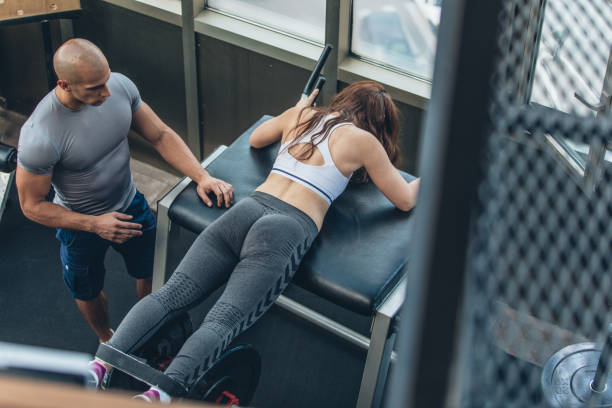 istock Trainer exercising with woman 1063909770