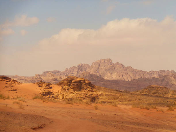 istock a rock in a red sand dessert 1063911510