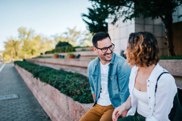 istock Dating concept. Two young people talking outdoors. 1063911882