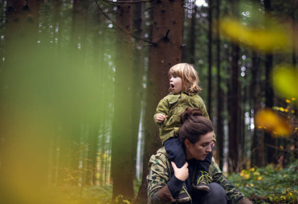 istock Toddler boy spending free time with his parent 1063912016