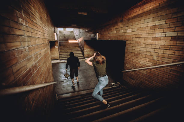 istock Man stealing handbag from young woman 1063917570