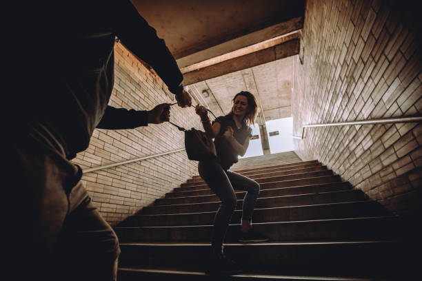 istock Man stealing handbag from woman 1063917640
