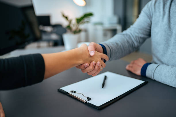 istock Business people handshake. Close-up. 1063924704