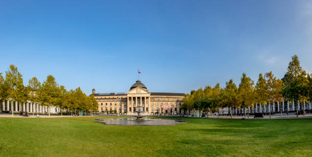 old Kurhaus in Wiesbaden WIESBADEN, GERMANY - OCT 18, 2018: Entrance of old Kurhaus in Wiesbaden with classic pillars.  The Kurhaus servves as casino nowadays kurhaus casino stock pictures, royalty-free photos & images