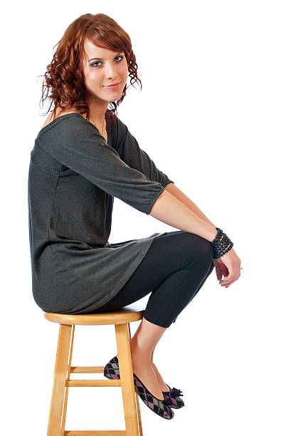 istock Pretty young woman on a stool 106393885