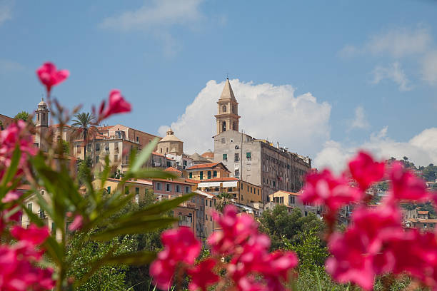 Cityscape with foreground flowers of Ventimiglia, Italy