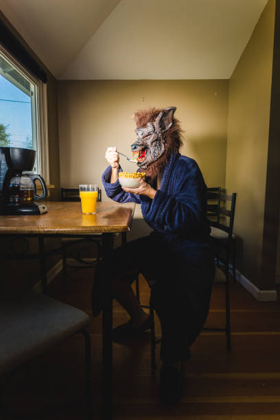 istock Werewolf Man Eating Breakfast On a Lazy Weekend Morning 1063942136