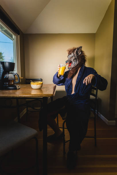 istock Werewolf Man Eating Breakfast On a Lazy Weekend Morning 1063942138