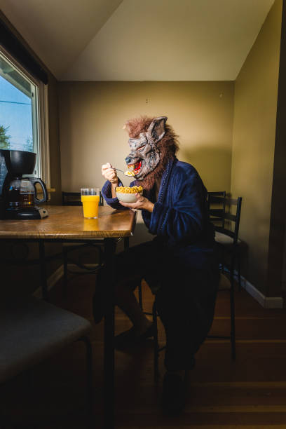 istock Werewolf Man Eating Breakfast On a Lazy Weekend Morning 1063942142