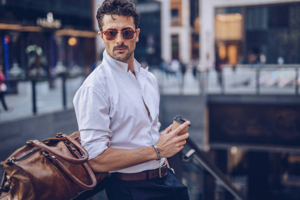 istock Charming businessman holding a bag 1063944848