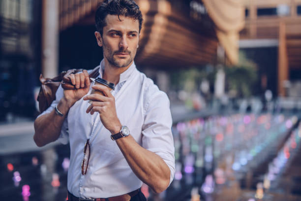 istock Charming businessman holding a bag 1063946420