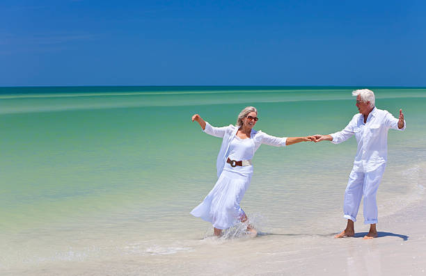 A couple headed for the sea on a Florida beach