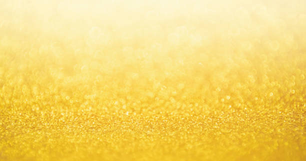 istock Abstract Gold glitter festive Christmas texture background blur with bokeh light 1063947462