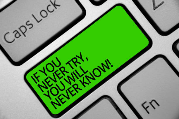 istock Handwriting text If You Never Try, You Will Never Know. Concept meaning Inspiration to make new thing Keyboard green key Intention create computer computing reflection document. 1063948406