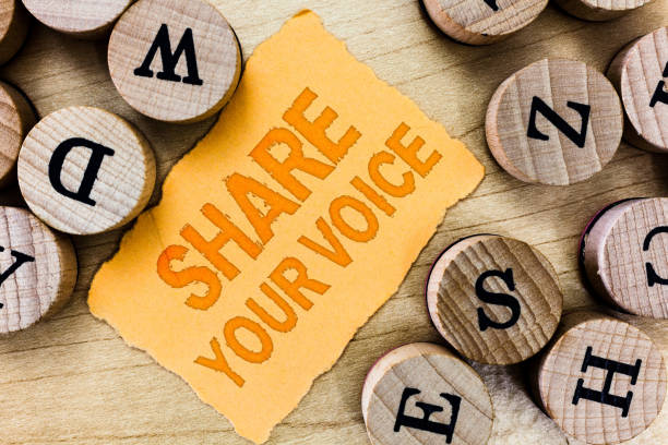 istock Handwriting text Share Your Voice. Concept meaning asking employee or member to give his opinion or suggestion 1063948420