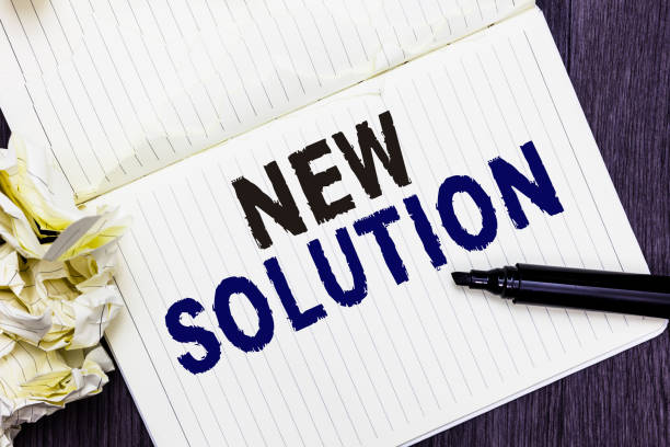 istock Conceptual hand writing showing New Solution. Business photo text Modern Innovation Latest effective approach to a problem Marker over notebook crumpled papers several tries mistakes. 1063948558