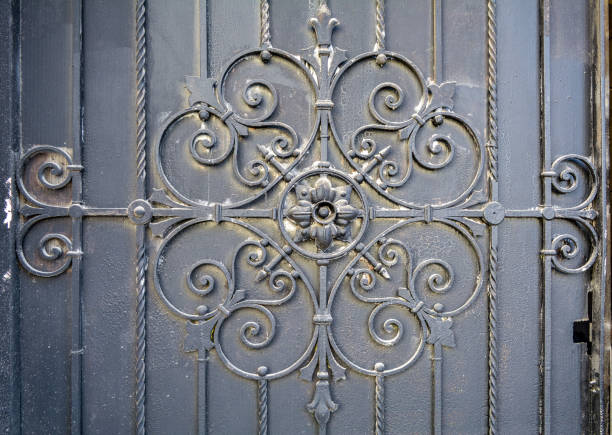 istock Element of architectural decor lattice, exterior. Metal wrought iron gate 1063955794