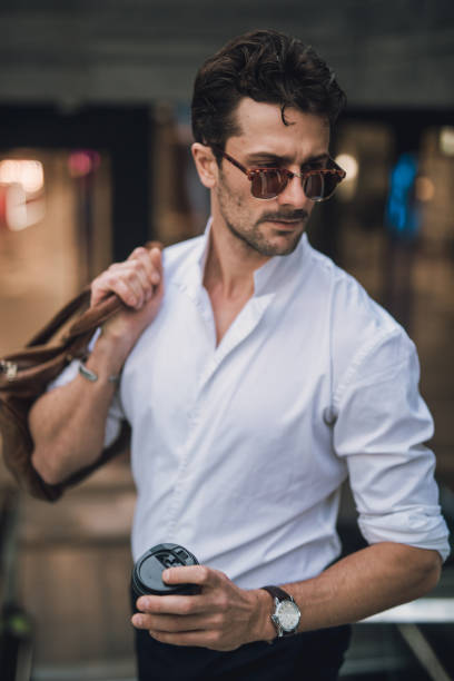 istock Charming businessman holding a bag 1063959466