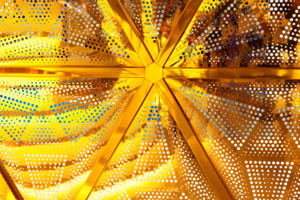 istock Black metal speaker mesh background. Metallic texture or pattern with hexagonal holes. 1063965992
