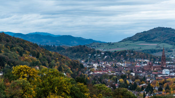 istock City next to autumn forest with bright colors 1063967264