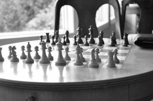 istock Chess board and pieces in a chess game 1063967470