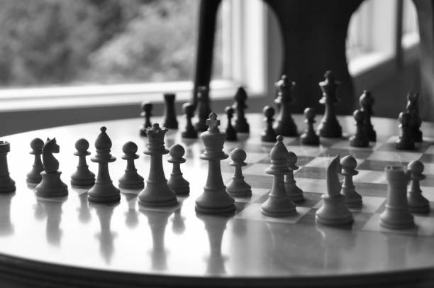 istock Chess board and pieces in a chess game 1063967506