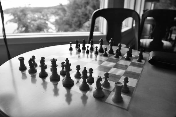 istock Chess board and pieces in a chess game 1063967532