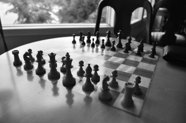 istock Chess board and pieces in a chess game 1063967546
