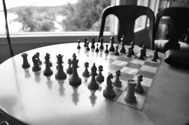 istock Chess board and pieces in a chess game 1063967562