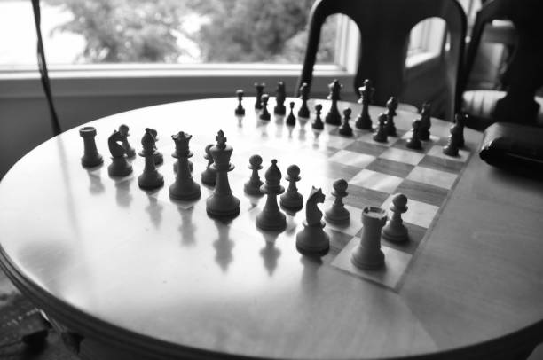 istock Chess board and pieces in a chess game 1063967578