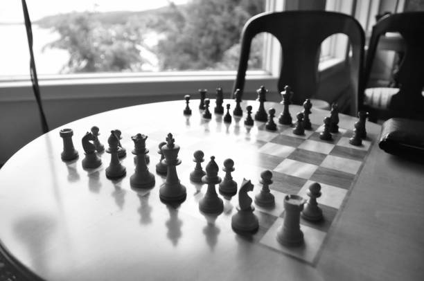istock Chess board and pieces in a chess game 1063967614
