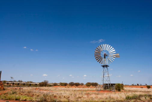 Very typical outback scene:a windmill in the middle of nowhere