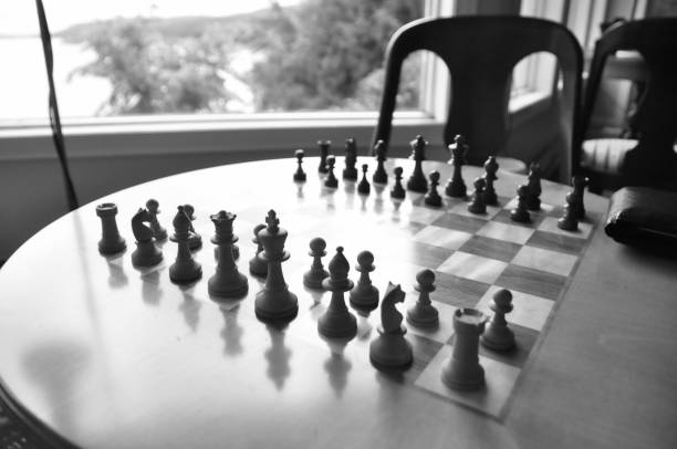 istock Chess board and pieces in a chess game 1063967642