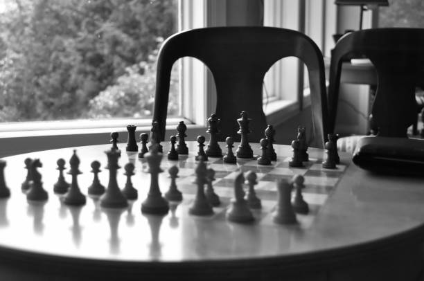 istock Chess board and pieces in a chess game 1063967728