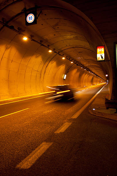 istock Car Speeding in Underground Tunnel 106396775