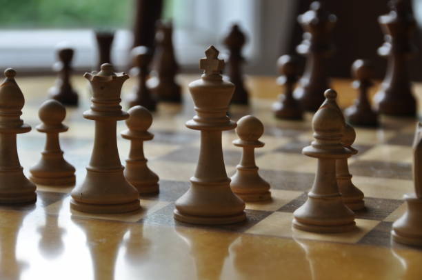 istock Chess board and pieces in a chess game 1063967920