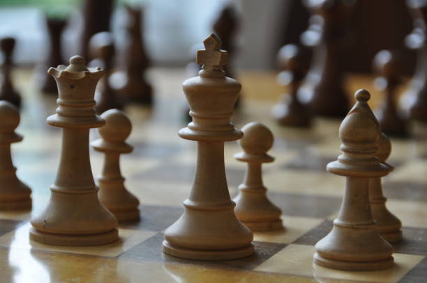 istock Chess board and pieces in a chess game 1063968036