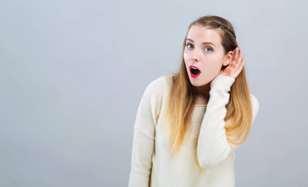 istock Young woman listening 1063968242