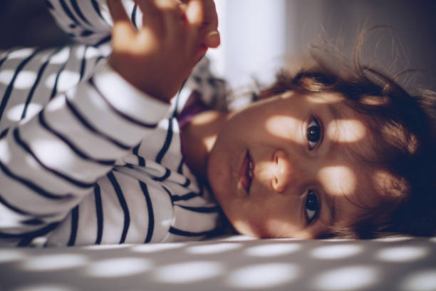 istock Little girl waking up 1063971404