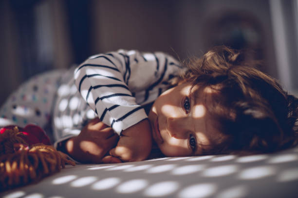 istock Cute little girl waking up 1063971590