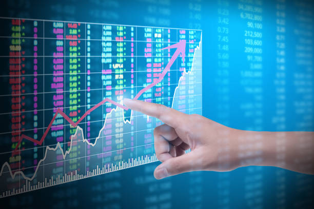 istock hand with financial chart symbols coming from hand 1063974516