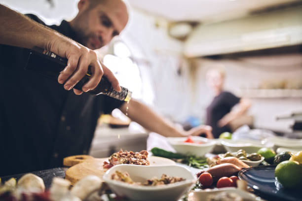 istock Giving Final Touch To Delicious Dish 1063976464