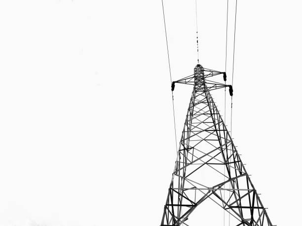 istock High voltage electricity tower close-up structure in black and white 1063980806